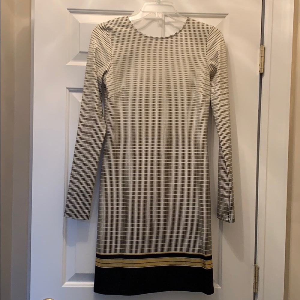 Black gold and cream dress